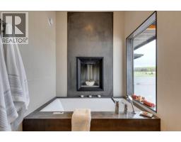 218 Grizzly Rise, Rural Rocky View County, AB T4C0B5 Photo 30