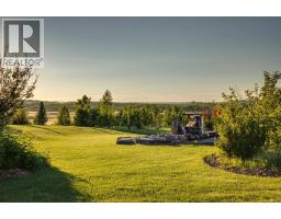 218 Grizzly Rise, Rural Rocky View County, AB T4C0B5 Photo 46