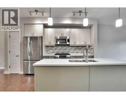 118, 28 Mcdougall Court NE - photo 6