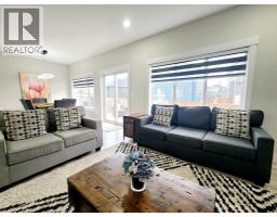 Living room - 1435 Scarlett Ranch Boulevard, Carstairs, AB T0M0N0 Photo 8