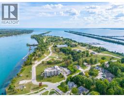 Living room/Fireplace - 34 Boblo Island Boulevard Unit# 407, Amherstburg, ON N9V0C4 Photo 7