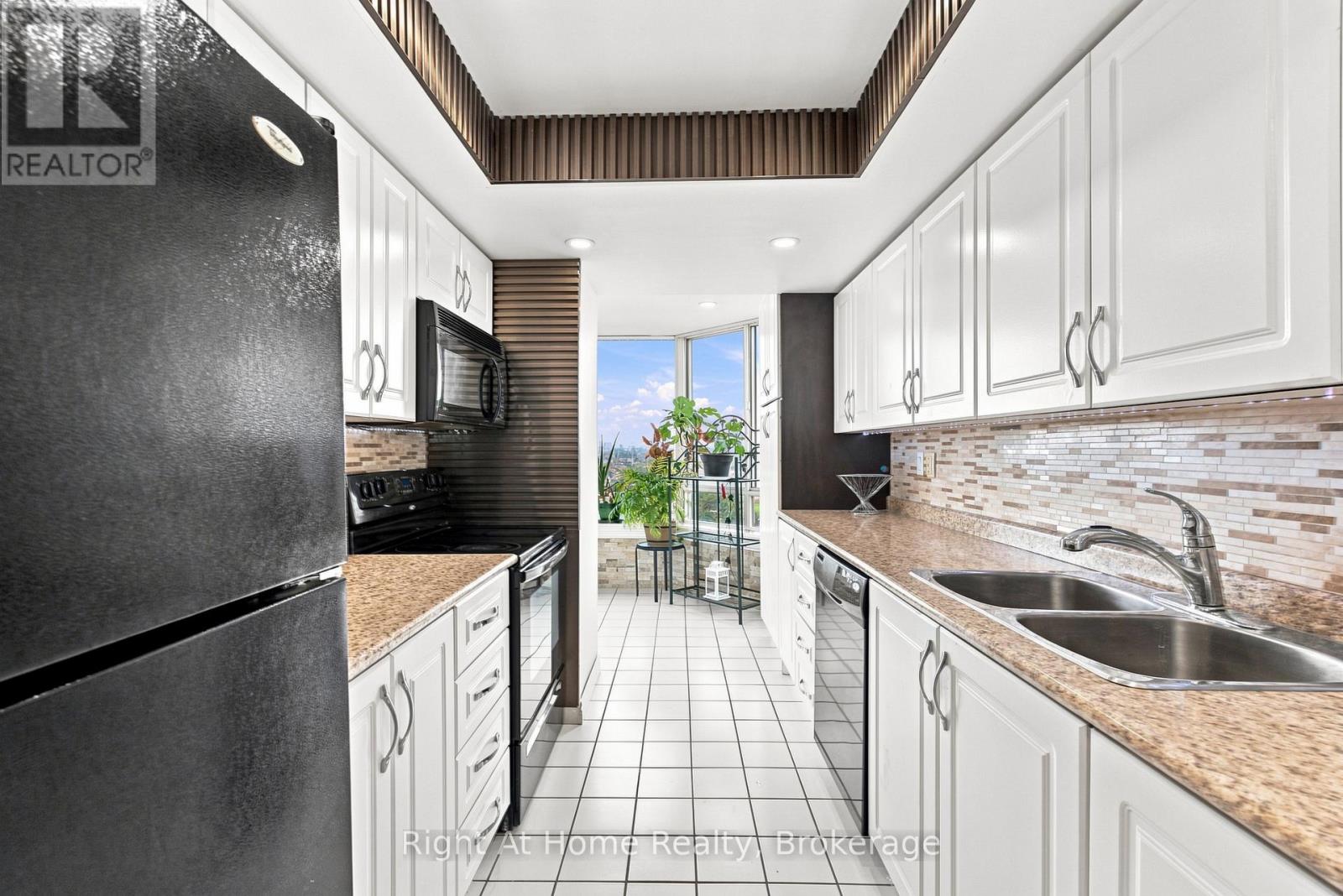 #1215 11753 SHEPPARD AVENUE E - 20