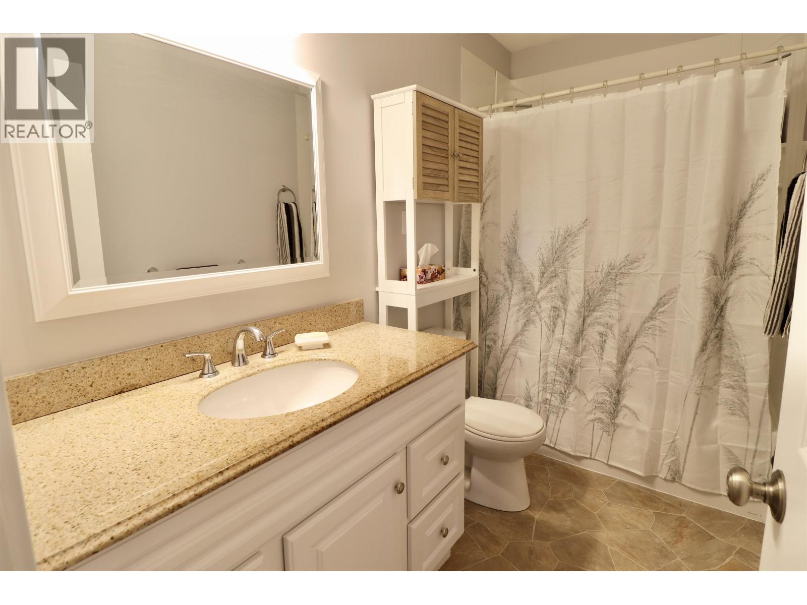 Photo 11 of 14 — 230 WILSON CRESCENT · Prince George, BC