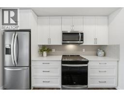 Living room - 224, 255 Les Jardins Park Se, Calgary, AB T2C5W9 Photo 6
