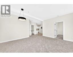 Living room - 301, 1905 Centre Street Nw, Calgary, AB T2E2S7 Photo 6