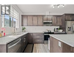 Family room - 120 Carringford Road Nw, Calgary, AB T3P2H1 Photo 11