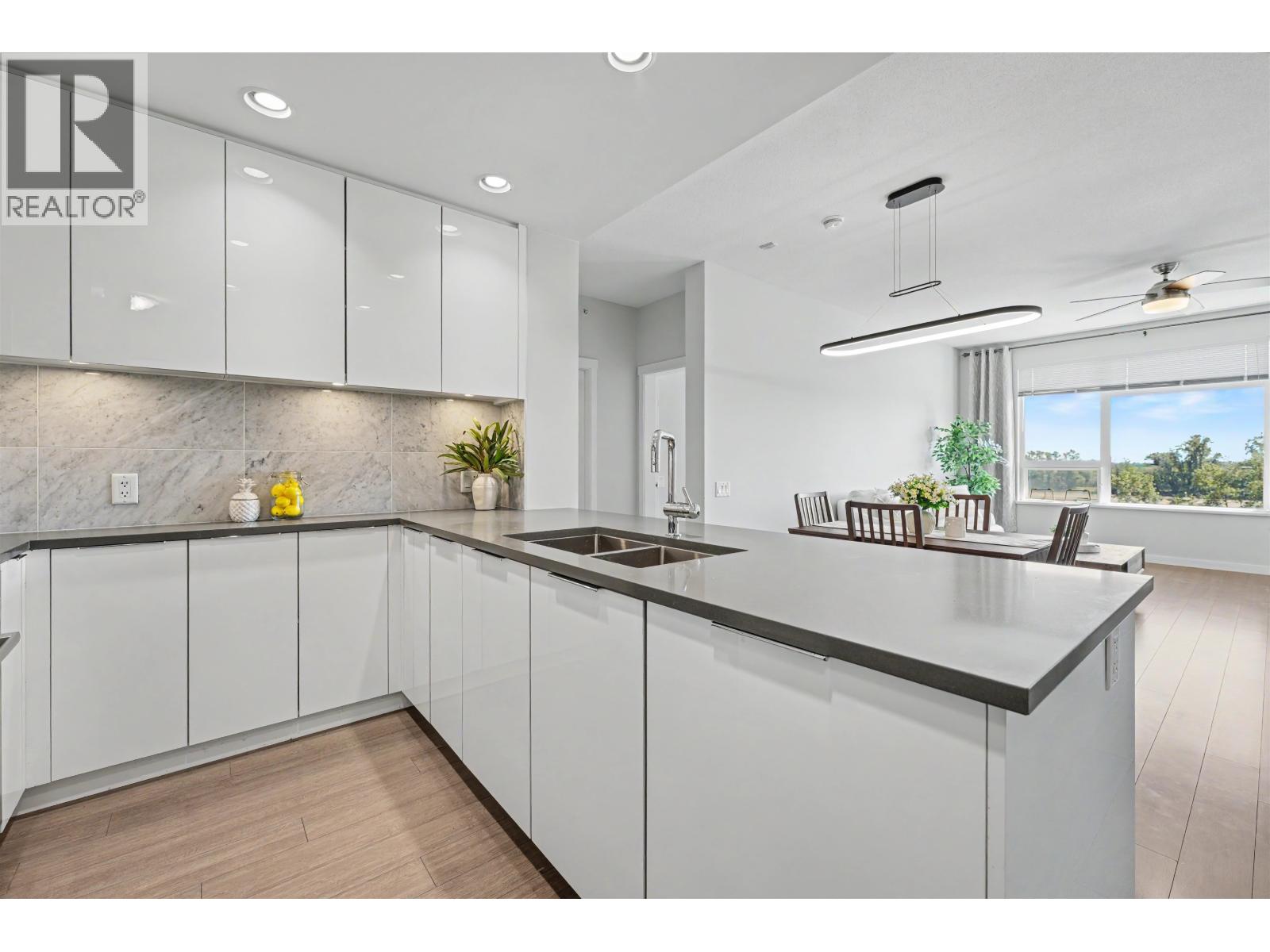604 3289 RIVERWALK AVENUE, Vancouver — photo 1