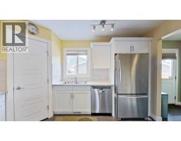 Living room - 109 Heartland Boulevard, Cochrane, AB T4C2R1 Photo 9