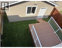 109 Heartland Boulevard, Cochrane, AB T4C2R1 Photo 23