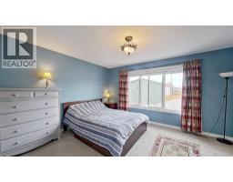 109 Heartland Boulevard, Cochrane, AB T4C2R1 Photo 16