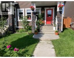 109 Heartland Boulevard, Cochrane, AB T4C2R1 Photo 22