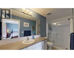 109 Heartland Boulevard, Cochrane, AB T4C2R1 Photo 19