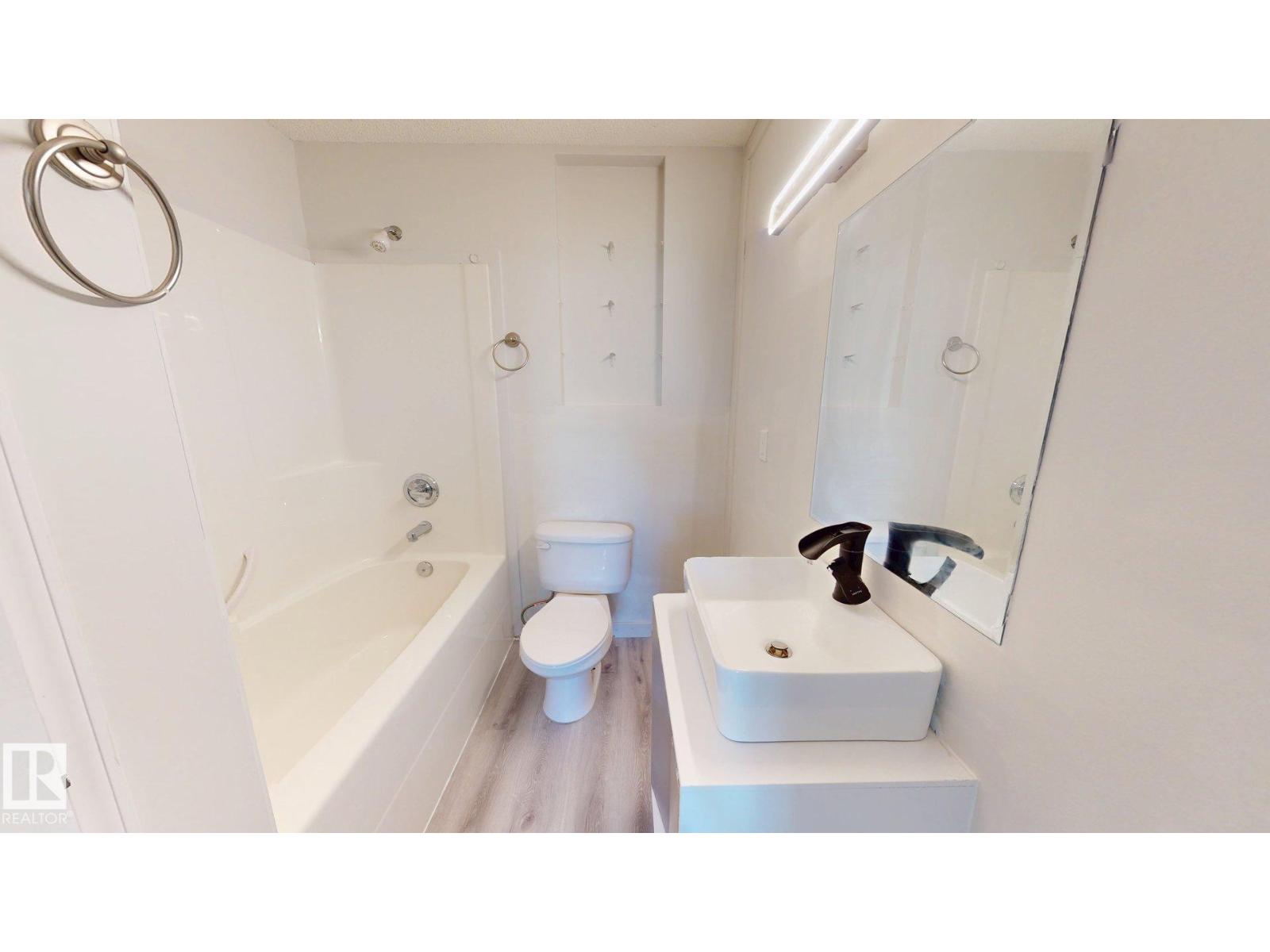 7936 3 Avenue SW, Ellerslie — photo 27 of 30: Property photo