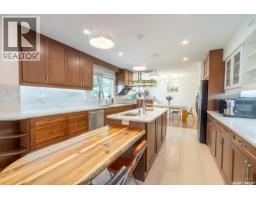 Living room - 127 Rogers Road, Regina, SK S4S6T7 Photo 13