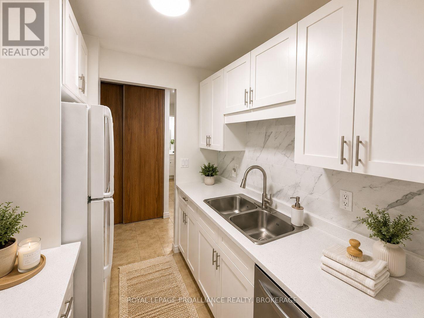 #215 334 QUEEN MARY ROAD - Image 12