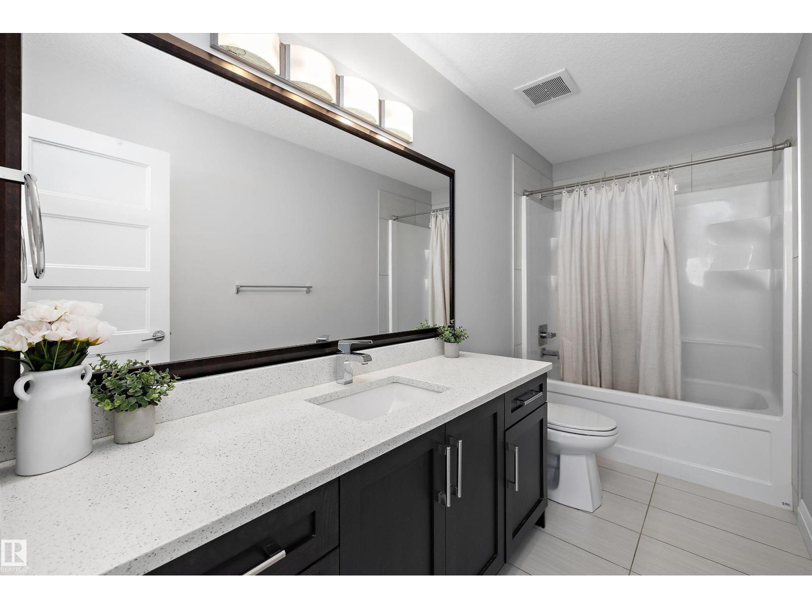 17355 11 Avenue SW, Windermere — photo 29 of 30: Property photo