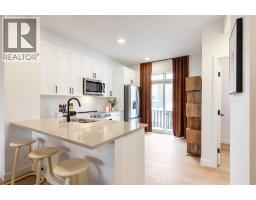 1203, 30 Rochester View NW - photo 1