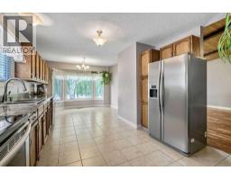 Laundry room - 163 Woodburn Crescent, Okotoks, AB T1S1L4 Photo 10