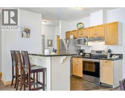 Living room - 316, 1151 Sidney Street, Canmore, AB T1W3G1 Photo 6