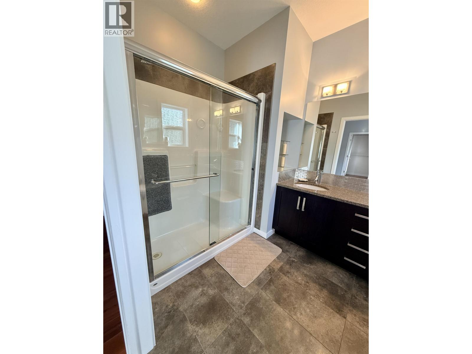 Photo 12 of 33 — 112 6525 DOMANO BOULEVARD · Prince George, BC