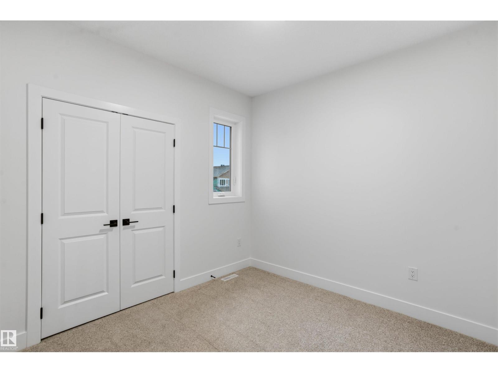 8425 223A ST NW - 32