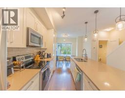 Primary Bedroom - 102, 1106 Bow Valley Trail, Canmore, AB T1W1N6 Photo 8