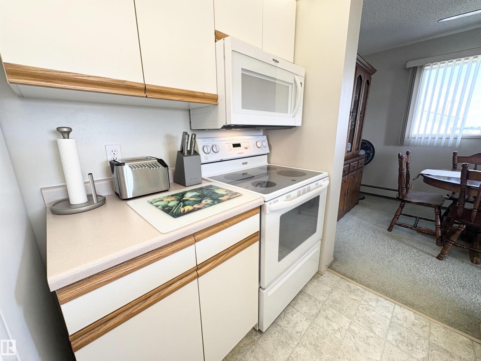 #410 4220 139 AV NW - 11