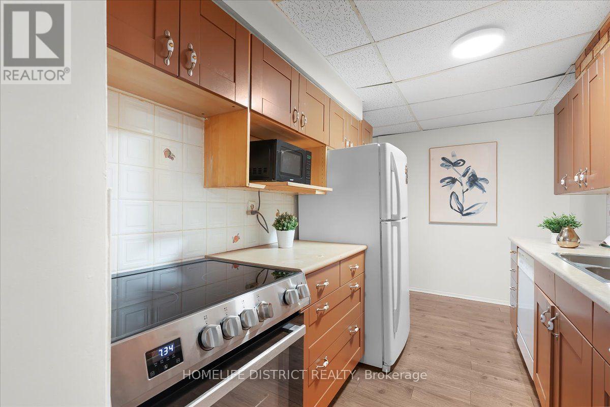 #404 3420 EGLINTON AVENUE E - 13