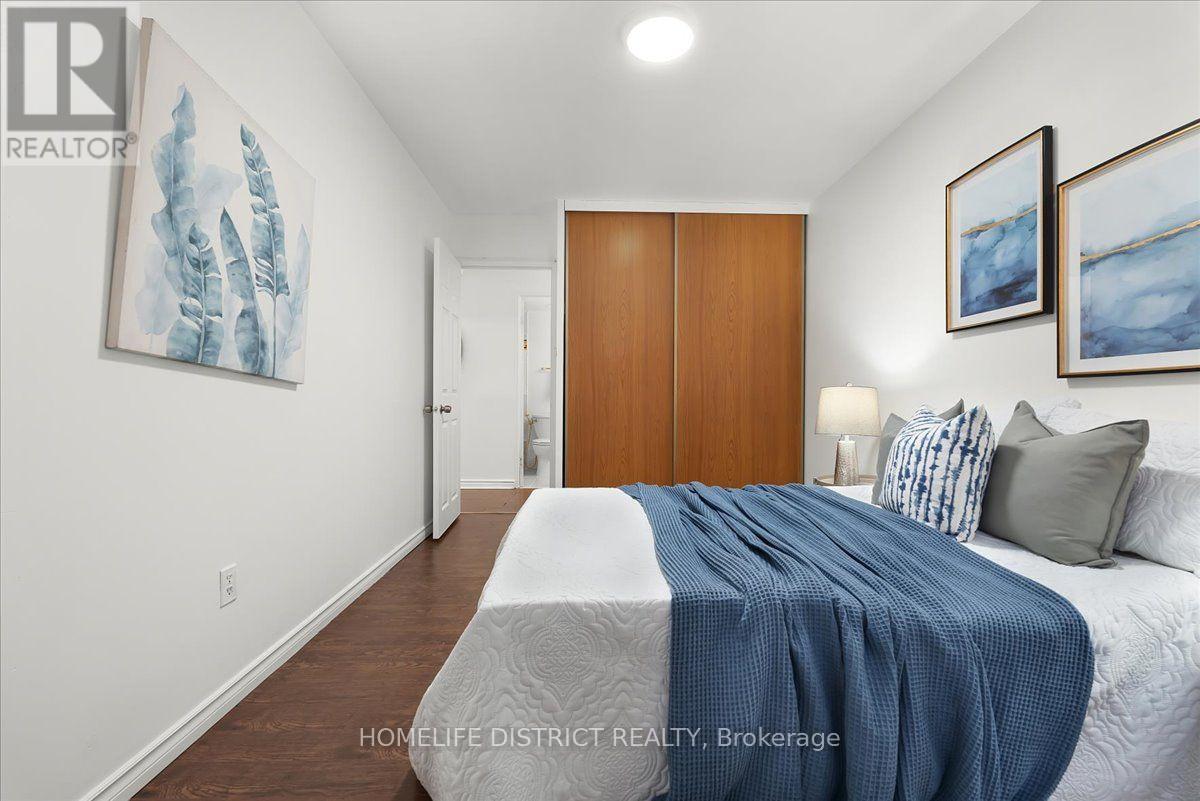 #404 3420 EGLINTON AVENUE E - 23