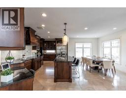 Family room - 2, 12016 Range Road 61a, Rural Cypress County, AB T1A7G7 Photo 15