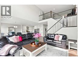 Den - 114 Kinniburgh Road, Chestermere, AB T1X0S5 Photo 15