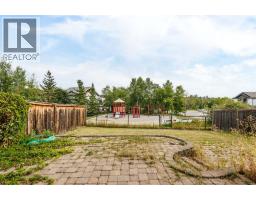 105 Cortina Bay Sw, Calgary, AB T3H0B5 Photo 47