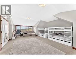 Family room - 198029 Spruce Meadows Way, Rural Foothills County, AB T1S3J9 Photo 26