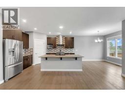 Laundry room - 154 Amblehurst Way Nw, Calgary, AB T3P2A1 Photo 11