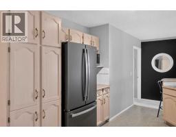 204, 39 Hidden Creek Place Nw, Calgary, AB T3A6B9 Photo 21