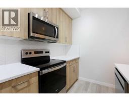 206, 71 Shawnee Common Sw, Calgary, AB T2Y0R2 Photo 8