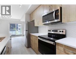 206, 71 Shawnee Common Sw, Calgary, AB T2Y0R2 Photo 9