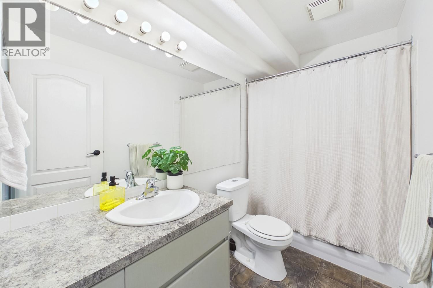 #302 987 KLO Road - Image 22