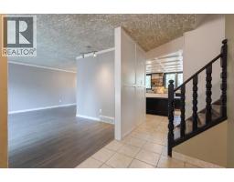 Living room - 4 Greenwood Court Sw, Medicine Hat, AB T1A7X7 Photo 6