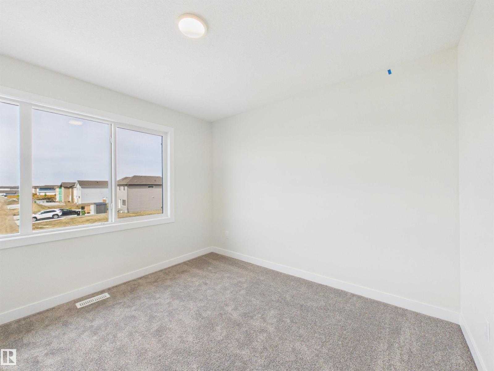 13 Scoria Wd, Sienna — photo 23 of 30