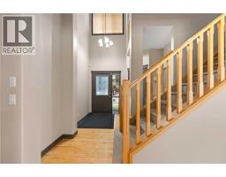 Living room - 49 Panamount Rise Nw, Calgary, AB T3K6B6 Photo 6