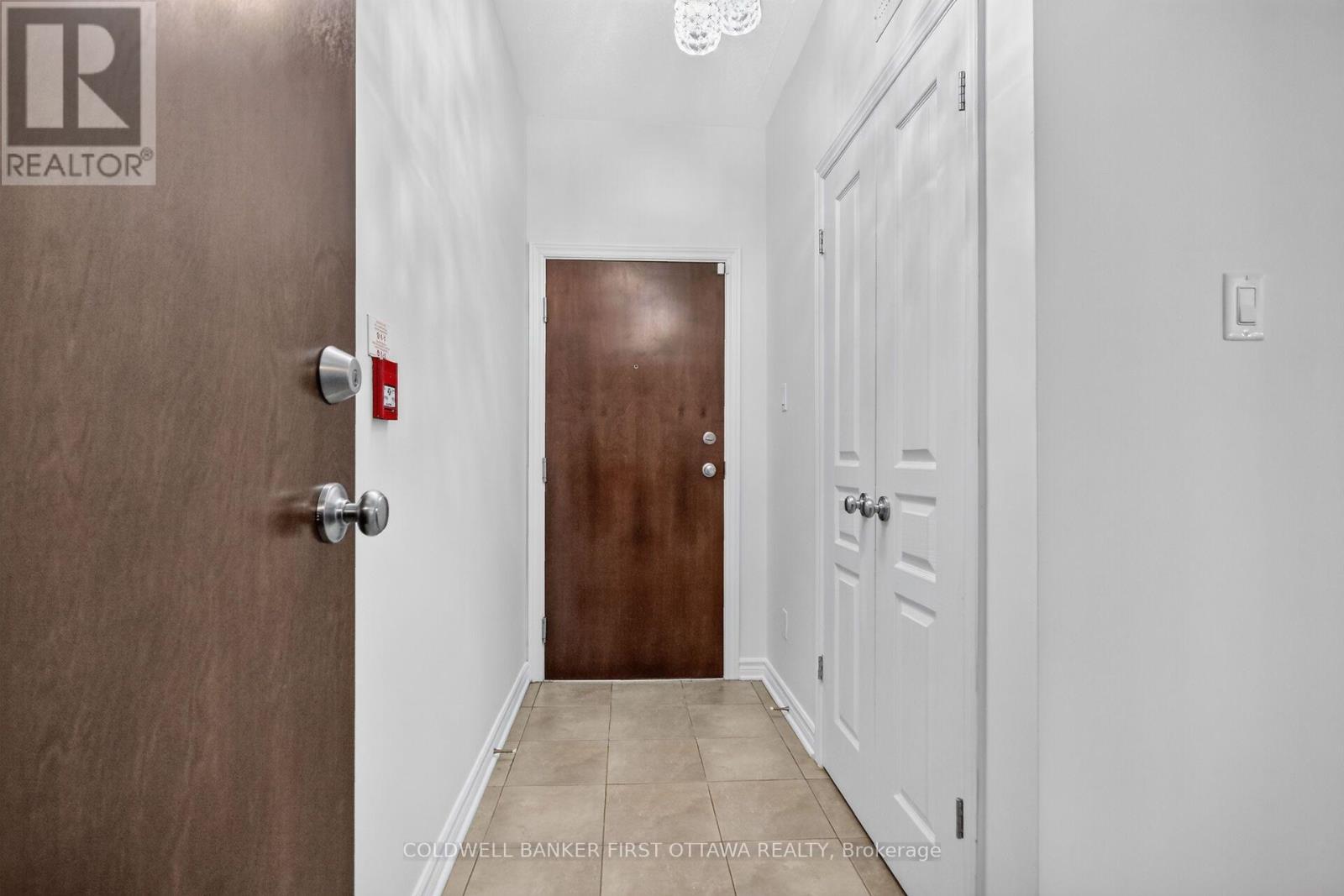 Wide foyer with double door closet