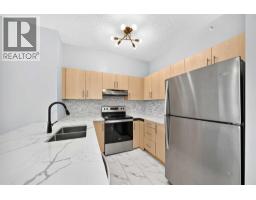 1412, 1140 Taradale Drive NE - photo 5