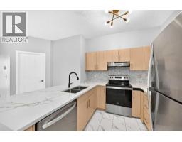 1412, 1140 Taradale Drive NE - photo 6