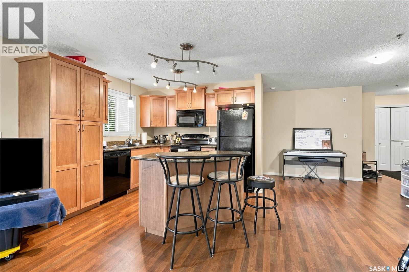 A106 103 Wellman LANE, Saskatoon — photo 10
