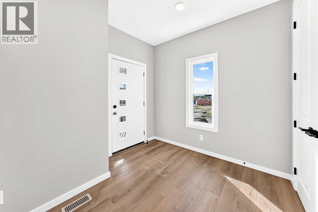 2084 Lancaster Heights SE, Airdrie — photo 2