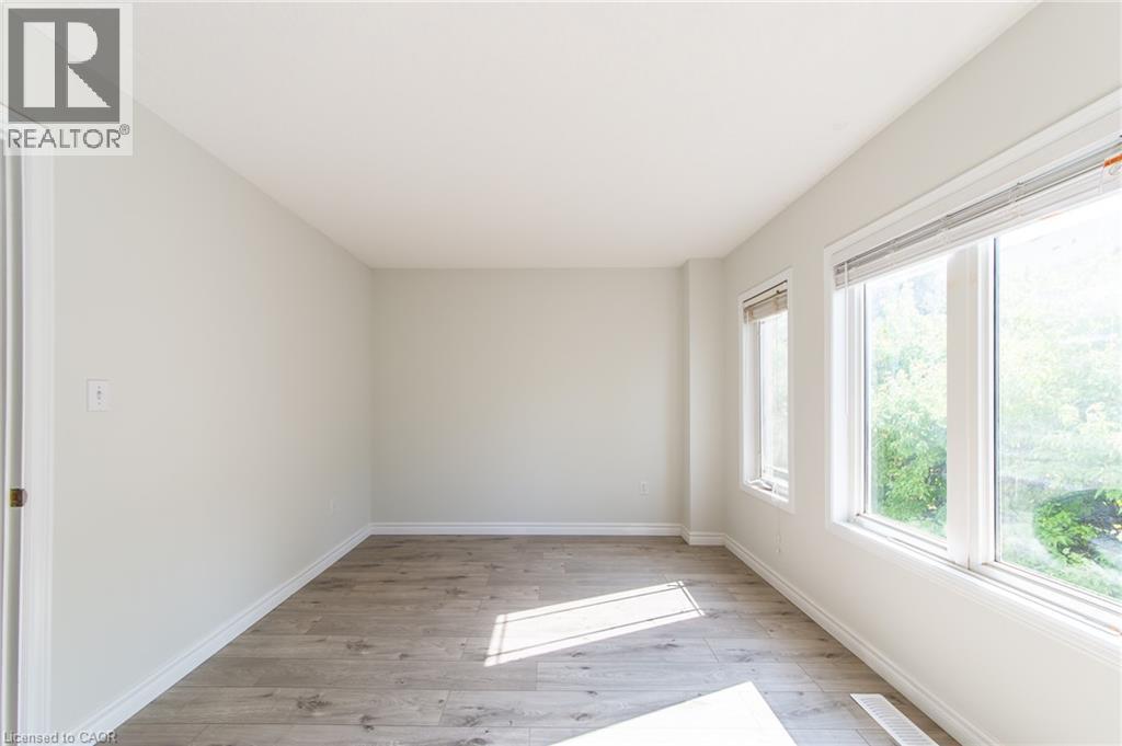 619 WILD GINGER Avenue Unit# J54, Waterloo — photo 9