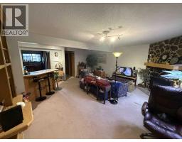 Living room - 635 Prairie Meadows Close W, Brooks, AB T1R0C9 Photo 7