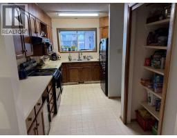 Primary Bedroom - 635 Prairie Meadows Close W, Brooks, AB T1R0C9 Photo 6
