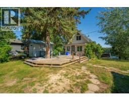 Primary bedroom of 25685 N NESS LAKE ROAD · Prince George, BC